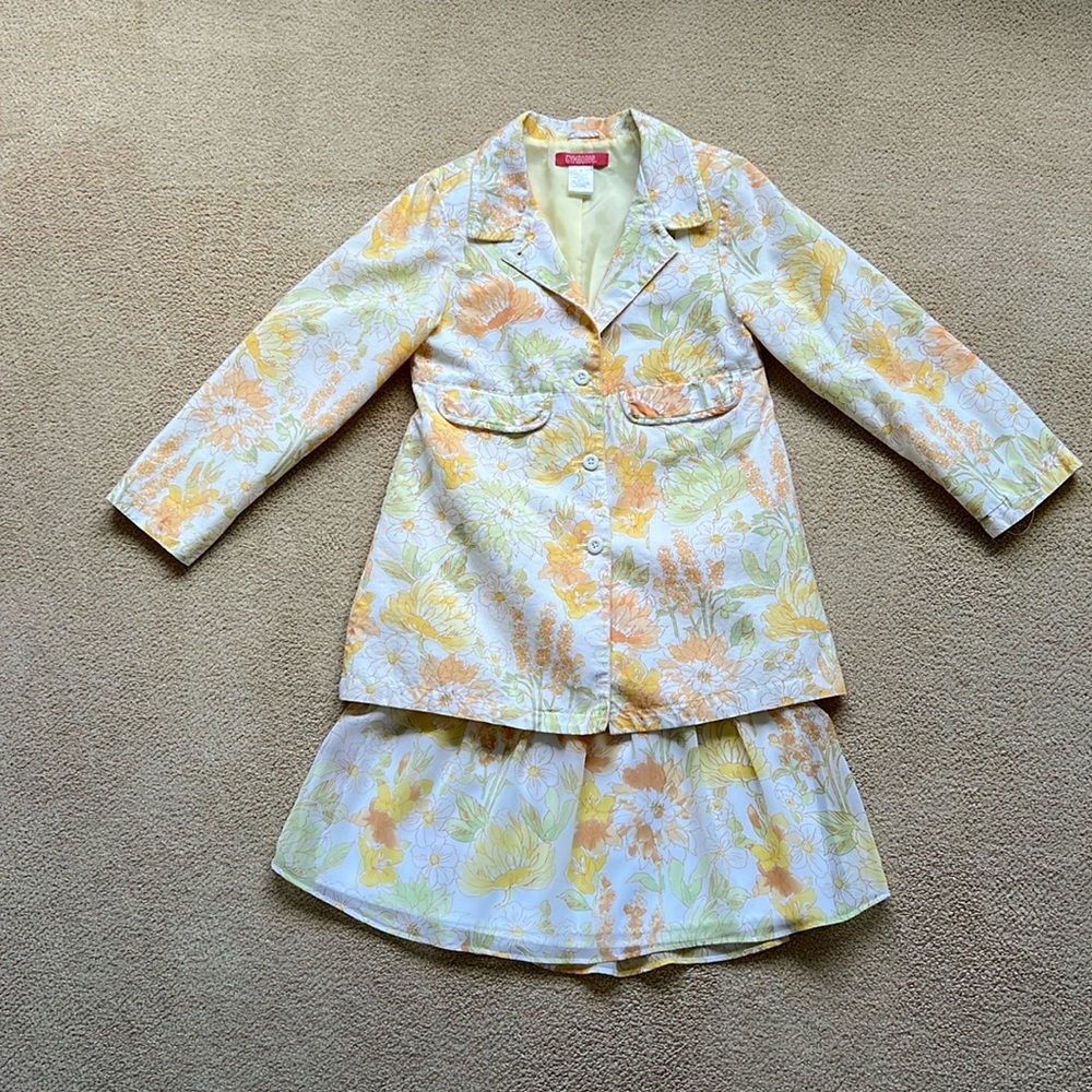 Girl’s floral print skirt and blazer